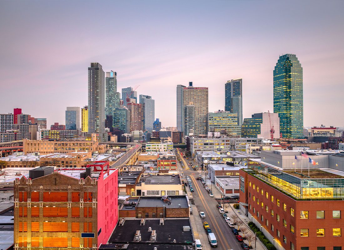 Contact - An Aerial Scenic View of Long Island City in New York During Sunset